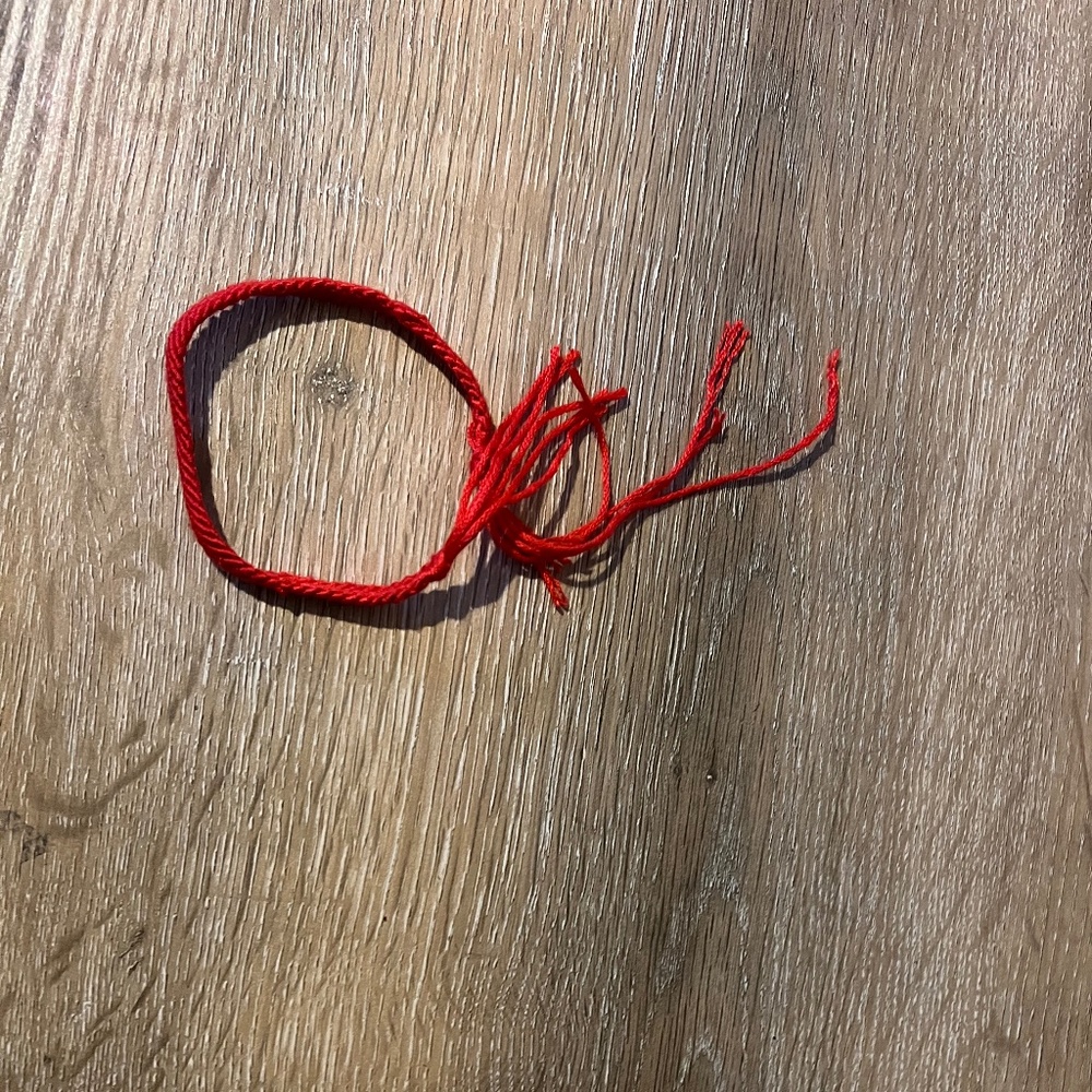 Red yarn bracelet